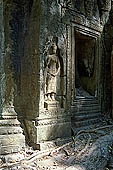 Ta Prohm temple - gopura of the gallery first found entering the site from west, sculpted devata